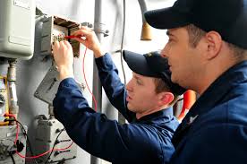 Electricians reparing wiring 